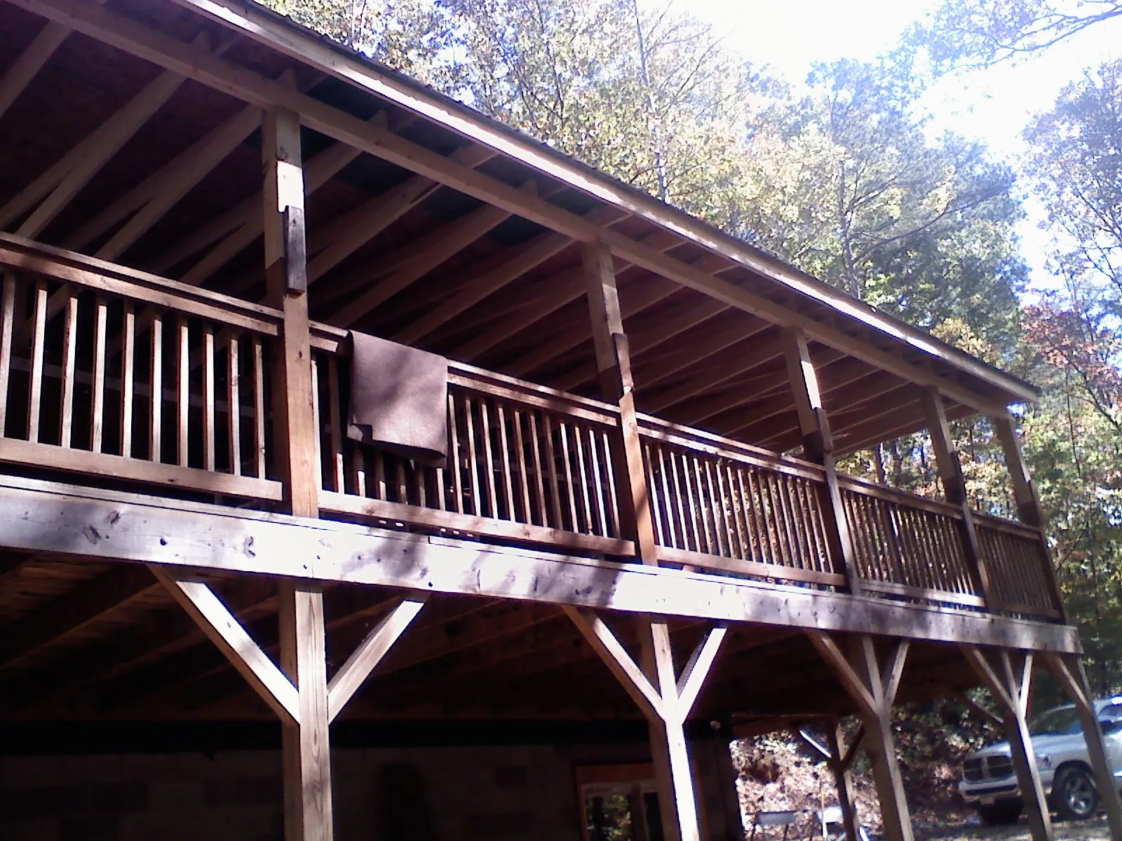 Timber framing under a new elevated porch and deck — Roof Leak Repair in Pfafftown by Roofing Brothers